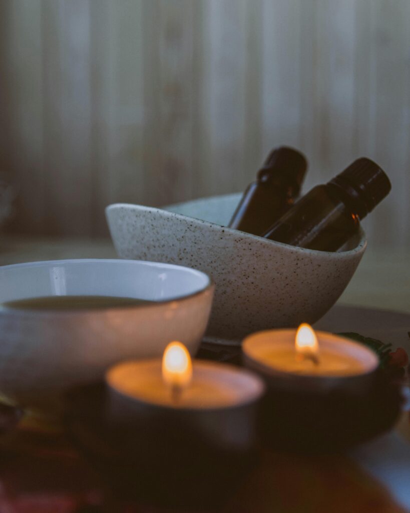 pexels-photo-9898741-9898741 A serene spa setting featuring aromatherapy candles and essential oils, perfect for relaxation.